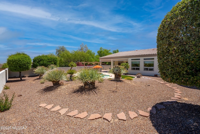 view of yard with a fenced backyard