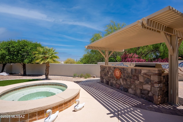 view of swimming pool featuring fence and an in ground hot tub