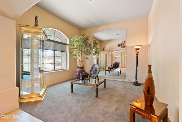 doorway to property featuring covered porch, stucco siding, and a tile roof