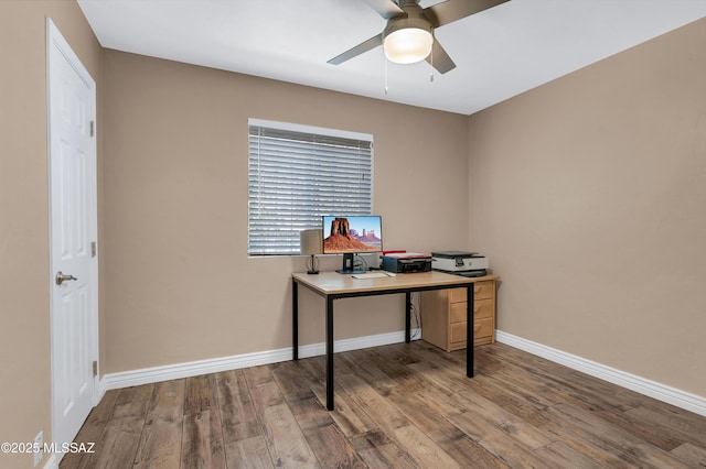 215 E Lester St, Tucson, AZ 85705 - home office with a ceiling fan, baseboards, and wood finished floors
