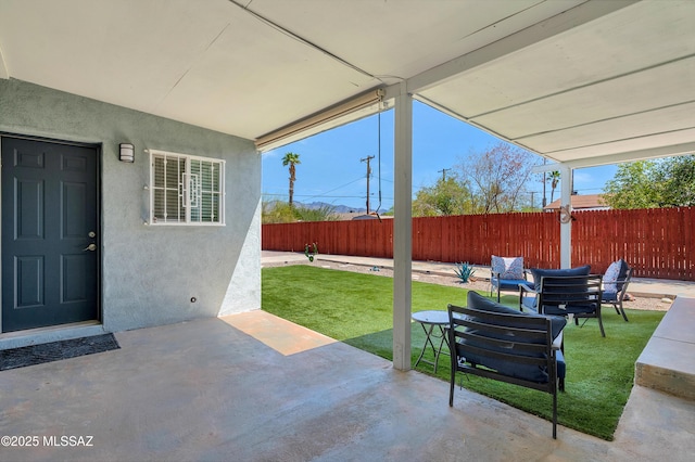 215 E Lester St, Tucson, AZ 85705 - view of patio featuring a fenced backyard