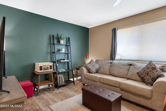 215 E Lester St, Tucson, AZ 85705 - living area featuring wood finished floors
