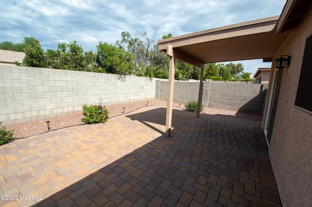 view of patio featuring a fenced backyard