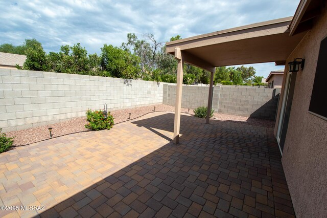 8769 E Green Branch Ln, Tucson, AZ 85730 - view of patio featuring a fenced backyard