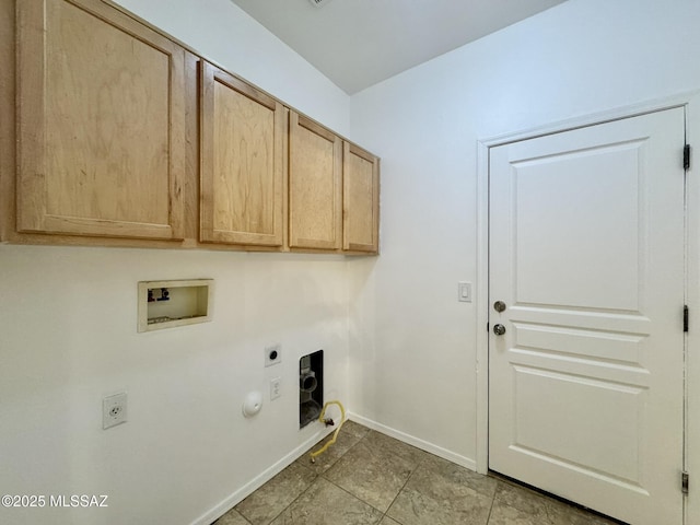 laundry room featuring washer hookup, electric dryer hookup, hookup for a gas dryer, cabinet space, and baseboards
