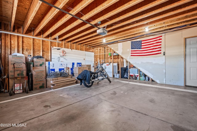 7571 N Rae Ave, Tucson, AZ 85741 - garage with a garage door opener and washer / clothes dryer
