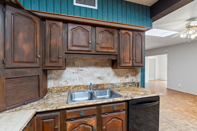 1011 N Placita Yoas, Green Valley, AZ 85614 - kitchen featuring dishwasher, a sink, ceiling fan, tasteful backsplash, and dark brown cabinetry