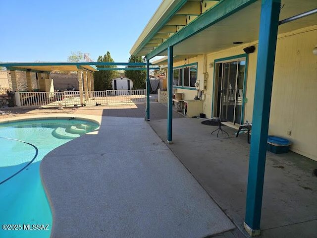 view of pool with a patio, a fenced backyard, and a fenced in pool