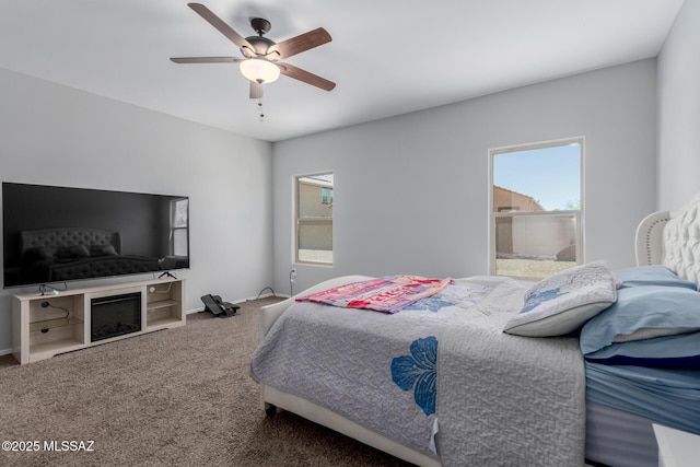 10157 N Sand Sage Trl, Marana, AZ 85653 - bedroom featuring carpet floors, ceiling fan, and multiple windows