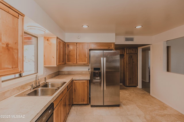 5417 E 3rd St, Tucson, AZ 85711 - kitchen with visible vents, a sink, stainless steel fridge with ice dispenser, light countertops, and recessed lighting