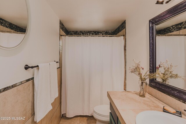 5417 E 3rd St, Tucson, AZ 85711 - full bath with toilet, tile patterned flooring, and vanity