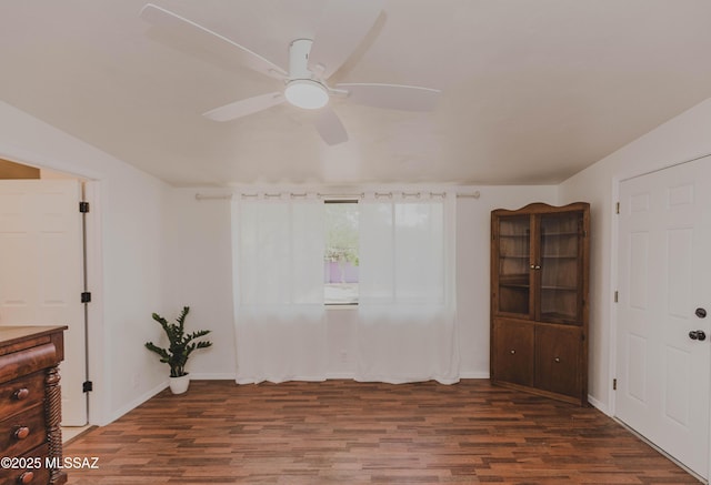 5417 E 3rd St, Tucson, AZ 85711 - spare room with baseboards, ceiling fan, and wood finished floors