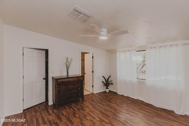 5417 E 3rd St, Tucson, AZ 85711 - spare room featuring visible vents, baseboards, ceiling fan, and wood finished floors