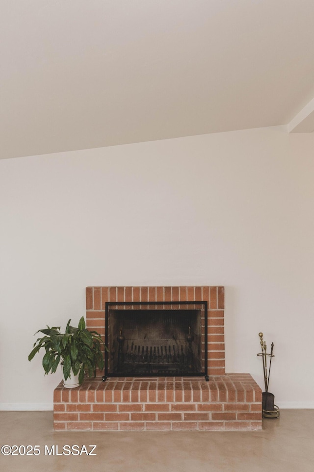 5417 E 3rd St, Tucson, AZ 85711 - details featuring baseboards and a brick fireplace