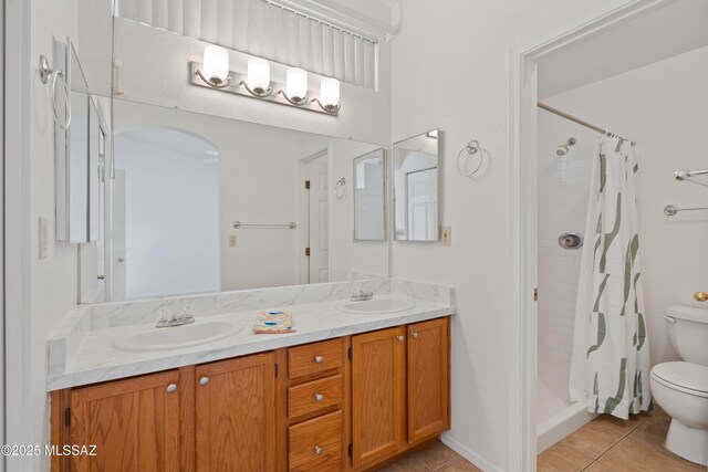 3564 W Sky Ridge Loop, Tucson, AZ 85742 - full bathroom featuring tiled shower and toilet
