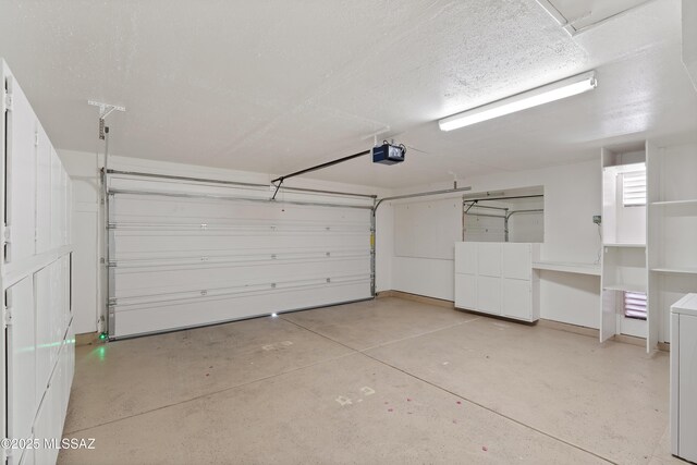 3564 W Sky Ridge Loop, Tucson, AZ 85742 - garage featuring separate washer and dryer and a garage door opener