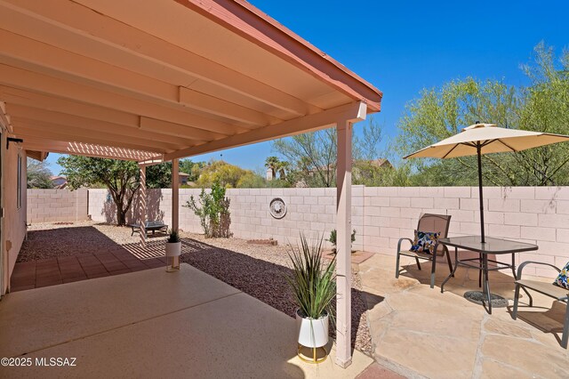 3564 W Sky Ridge Loop, Tucson, AZ 85742 - fenced backyard featuring a patio area