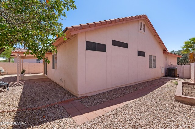3564 W Sky Ridge Loop, Tucson, AZ 85742 - fenced backyard with a gate and a patio