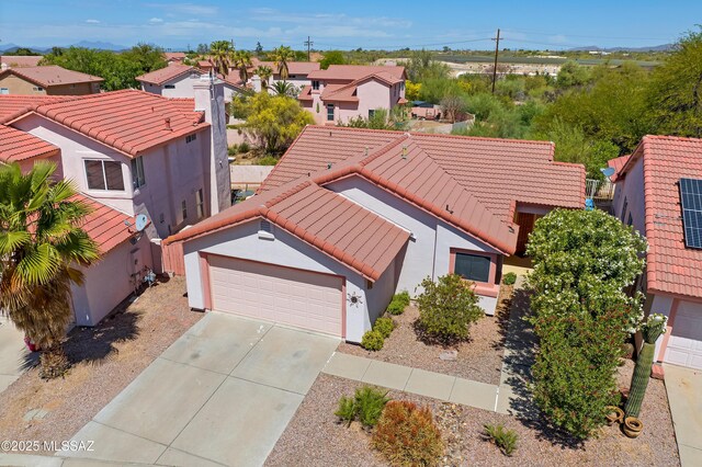 3564 W Sky Ridge Loop, Tucson, AZ 85742 - aerial perspective of suburban area featuring a mountain backdrop