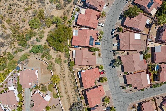 3564 W Sky Ridge Loop, Tucson, AZ 85742 - aerial overview of property's location with a mountain backdrop and nearby suburban area