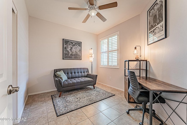 office space featuring light tile patterned floors, baseboards, and ceiling fan
