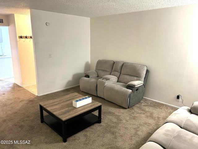 1470 S Palo Verde Ave, Tucson, AZ 85713 - carpeted living area featuring a textured ceiling and baseboards