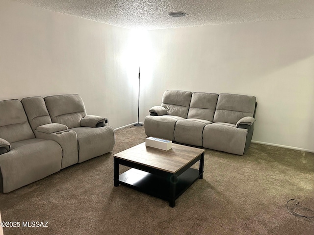 1470 S Palo Verde Ave, Tucson, AZ 85713 - living area featuring baseboards, carpet flooring, a textured ceiling, and visible vents