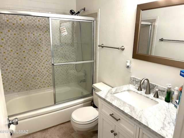 1470 S Palo Verde Ave, Tucson, AZ 85713 - bathroom featuring vanity, enclosed tub / shower combo, and toilet