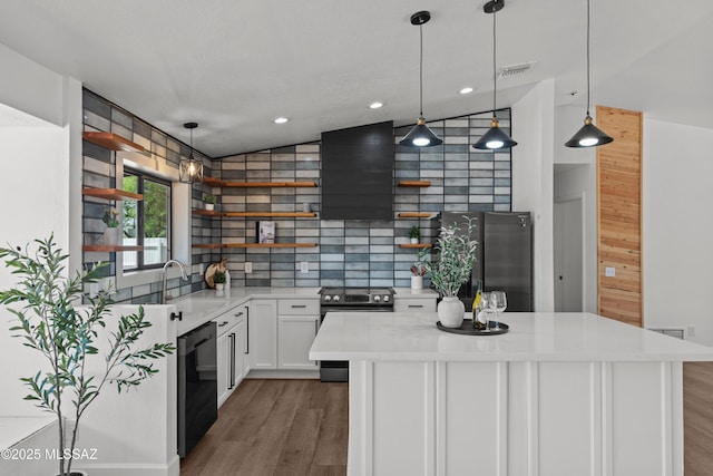 kitchen with open shelves, stainless steel appliances, wood finished floors, and visible vents