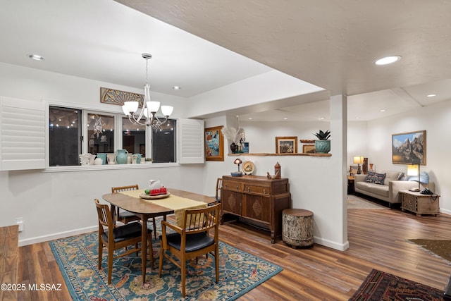 1408 W Kandy Ct, Tucson, AZ 85745 - dining area featuring a chandelier, baseboards, wood finished floors, and recessed lighting