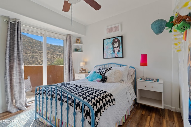 1408 W Kandy Ct, Tucson, AZ 85745 - bedroom featuring wood finished floors, access to outside, baseboards, ceiling fan, and a mountain view