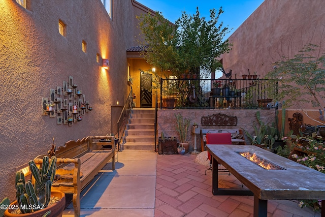 1408 W Kandy Ct, Tucson, AZ 85745 - view of patio with an outdoor fire pit and fence