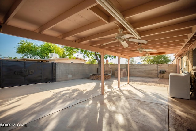 view of patio / terrace featuring a fenced backyard and ceiling fan