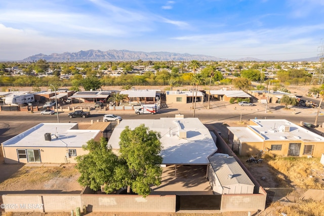 birds eye view of property with a residential view and a mountain view