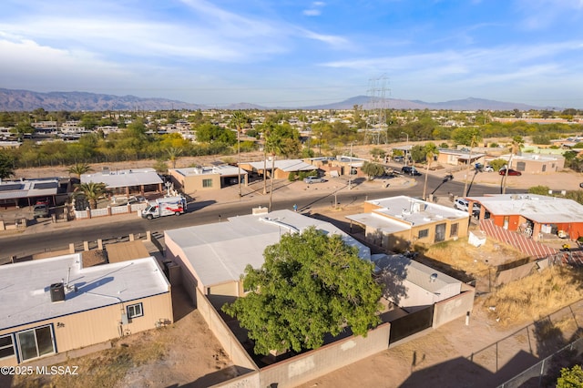 drone / aerial view featuring a mountain view and a residential view