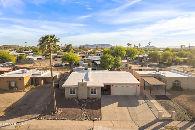 bird's eye view featuring a residential view and a mountain view