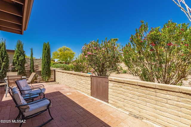 view of patio with fence