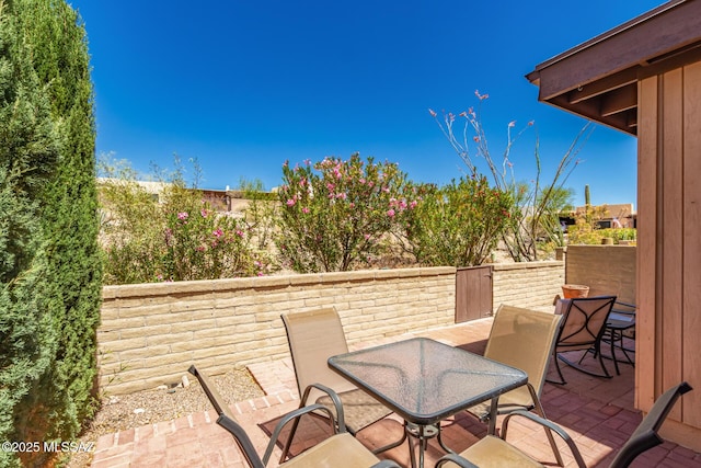 view of patio featuring outdoor dining space