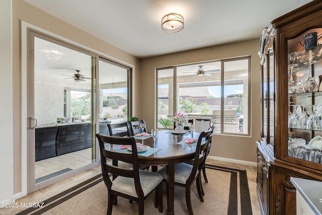dining room with ceiling fan