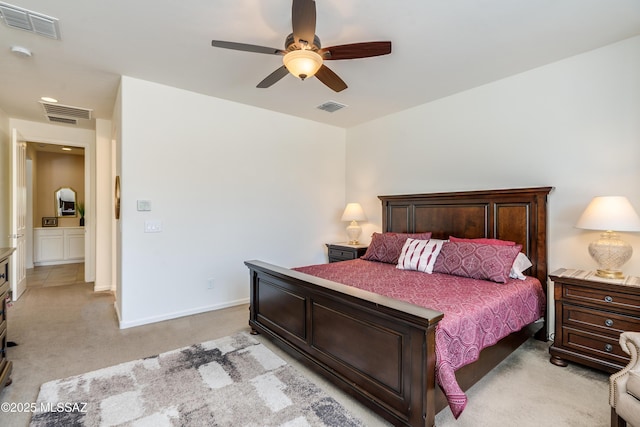 bedroom featuring light colored carpet, a ceiling fan, and visible vents