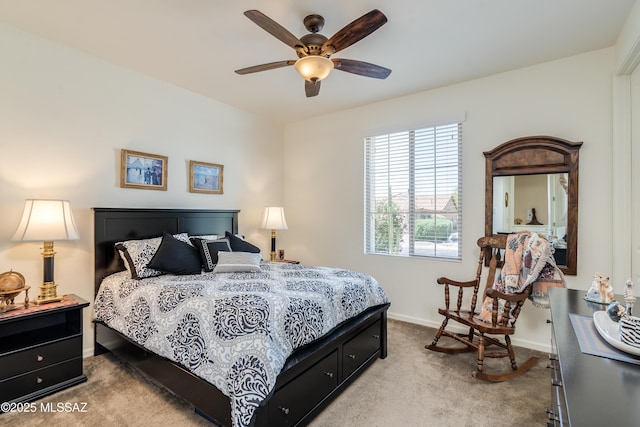 bedroom with baseboards, a ceiling fan, and carpet flooring