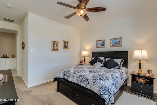 bedroom with baseboards, visible vents, light carpet, and ceiling fan