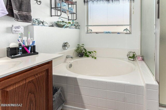 630 E Racine Pl, Casa Grande, AZ 85122 - bathroom with vanity and a bath