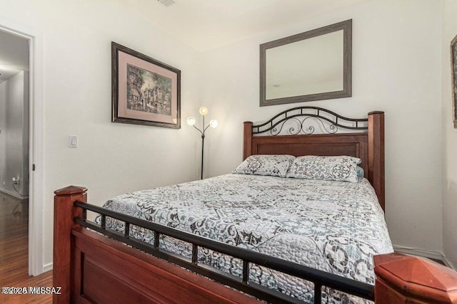 630 E Racine Pl, Casa Grande, AZ 85122 - bedroom with wood finished floors