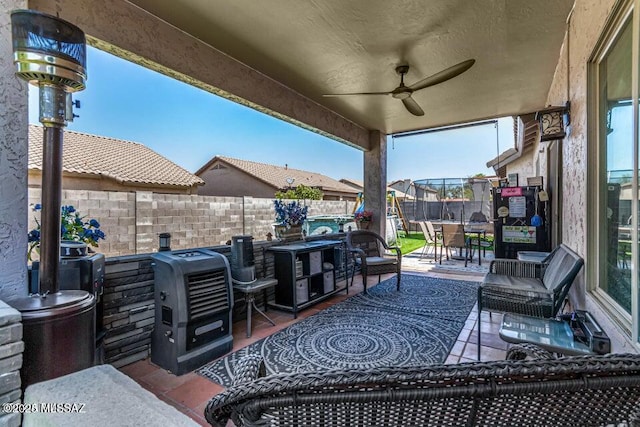 630 E Racine Pl, Casa Grande, AZ 85122 - view of patio with ceiling fan, outdoor dining area, and a fenced backyard