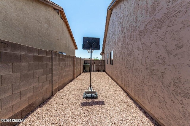 630 E Racine Pl, Casa Grande, AZ 85122 - view of home's exterior with fence and stucco siding