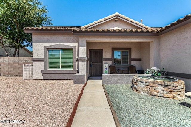 630 E Racine Pl, Casa Grande, AZ 85122 - view of front of home featuring stucco siding and fence