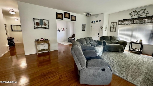 630 E Racine Pl, Casa Grande, AZ 85122 - living room with baseboards and wood finished floors
