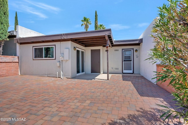 rear view of house with a patio area