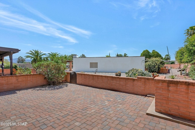 view of patio with fence
